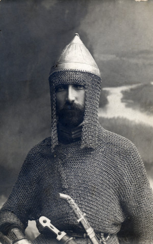 Czar Nicholas in chain mail armour with dagger and sword, postcard