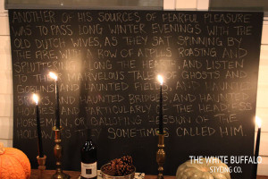 candlesticks with black tapers and pumpkins add to that Halloween feel ...