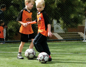 Little+children+playing+football
