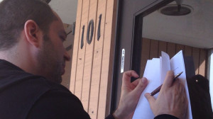 Jan Koum signs the $19 billion Facebook deal paperwork on the door of ...