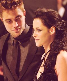 The way he looks at her kills me. I wonder if she's aware of how lucky ...