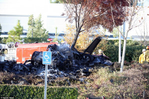 Aftermath: Firefighters attend the scene where Paul Walker died when ...