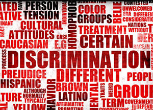 This is a photo of a collage showing words related to prejudice.