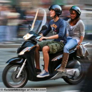 Young-Italian-Couple-Enjoying-A-Scooter-Ride.jpg