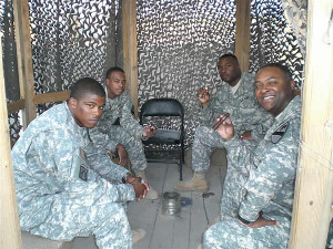 ... relaxing in their smoking area at Camp Liberty, Iraq 24 Aug 07