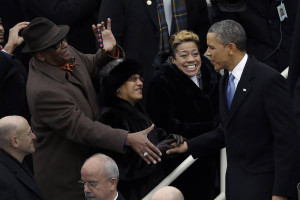 Obama greets well wishers as he arrives at the ceremonial swearing in