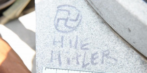 Jackie Robinson statue defaced with racist slurs, swastikas outside ...