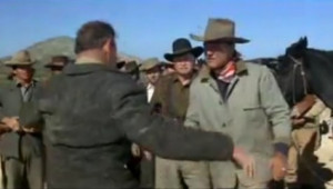 John Wayne Someone ougt to belt you in the mouth But I won t I won t ...