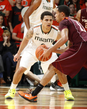 Shane Larkin Shane Larkin #0 of the Miami Hurricanes defends against ...