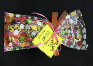 Reeses Pieces candy bags tied up with a tag that says: Thank you for ...