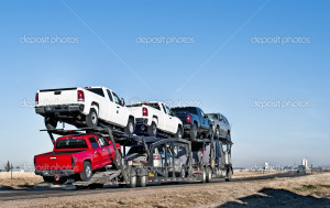 Big truck with car-hauling trailer - Stock Image