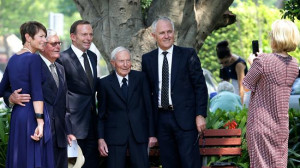 Turnbull having their picture taken by Lucy Turnbull after the funeral