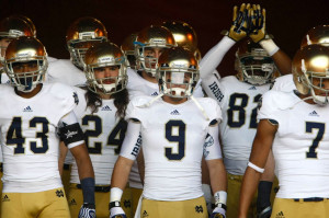 Notre Dame Players Wait To