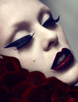 Dramatic winged eye liner and dark red lips #make-up #beauty