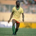 18 Mar 1984: Roger Milla of Cameroon keeps an eye on the ball.