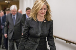 Rep. Marsha Blackburn (R., Tenn.) and other lawmakers, walk to a ...