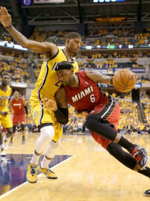 Pacers forward Paul George tries to stop Miami Heats forward LeBron ...