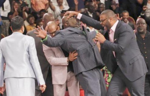 Tyler Perry Laying hands on Bishop T.D. Jakes