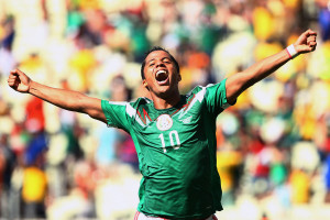 Giovani dos Santos of Mexico celebrates scoring his team's first goal ...