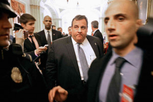 hide caption New Jersey Gov. Chris Christie is surrounded by security ...