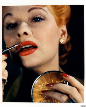 ... emphasize her glamorous eyes was to swipe on some deep red lipstick