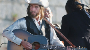 Bob Dylan, seen performing at the Newport Folk Festival in 2002 ...