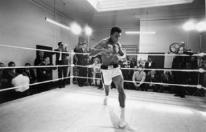 Muhammad Ali throwing bare-handed punches while training for his fight ...