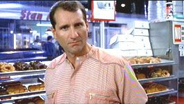 The name of the manager of the donut shop (played by Ed O'Neil) is: