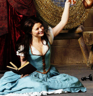Belle reading and drinking iced tea. (She and Regina are the only two ...