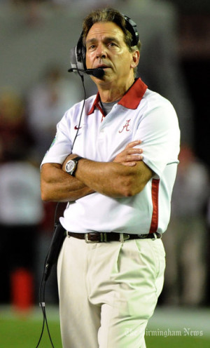 Alabama Coach Nick Saban loks to the clock late in the Ole Miss game ...