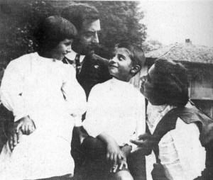 ... Giorgio as a young boy with his father, mother, and sister Luciana