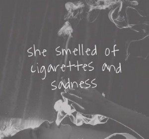 She smelled of cigarettes and sadness