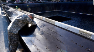 ... attacks of 9/11, pauses at the South Pool of the 9/11 Memorial on