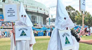 Why did you choose the Ku Klux Klan mask to lodge your protest?