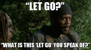 still michonne tries to get him to calm down she