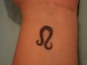 attractive-black-ink-leo-zodiac-sign-tattoo.jpg