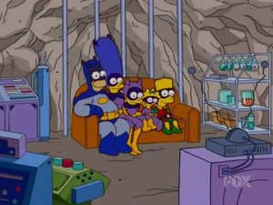 ... . Homer is dressed as Batman and Bart as the Boy Wonder, Robin