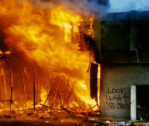 ... shopping mall at the corner of Pico and La Brea is engulfed in flames