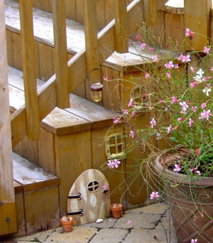 not into Fairy Gardens, but this would be very cute for the deck ...