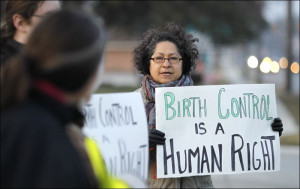 ... of the National Organization for Women rallied Friday on Secor Road