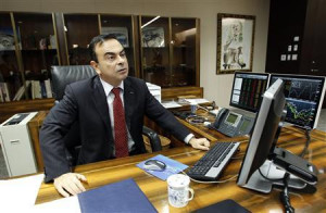 Carlos Ghosn, Chairman and CEO of Renault-Nissan Alliance, sits at his ...