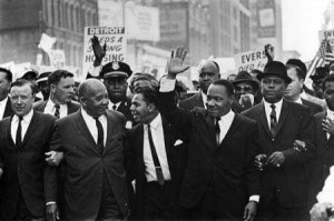 ... second from right, marched with UAW President Walter P. Reuther, left