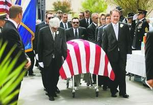 The casket holding the body of former Nevada Gov. Kenny Guinn is ...