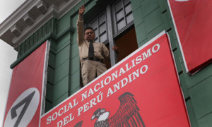 Peruvian Nazi party leader Martín Quispe Mayta salutes from his ...