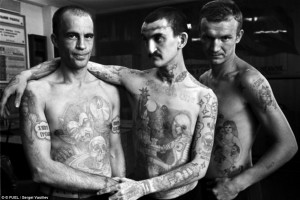 The men in the photos are all gang members, locked up for a variety of ...