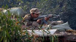 Pakistani army soldier takes position in Peshawar, Pakistan, on Dec ...