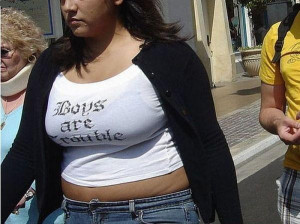 fat woman wearing a shirt saying Boys are Trouble.