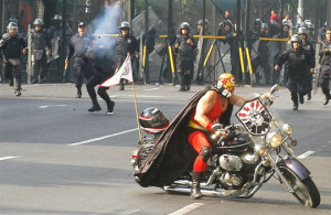 Funny photos funny luchador motorcycle riot police