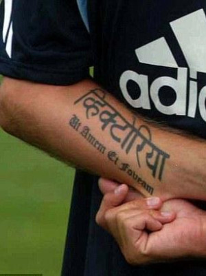 the name of his wife victoria written in hindi on his left hand and ...