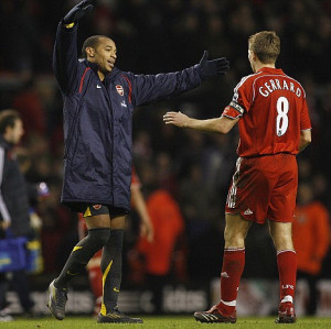 Friendly rivalry: Liverpool's Steven Gerrard is consoled by Thierry ...